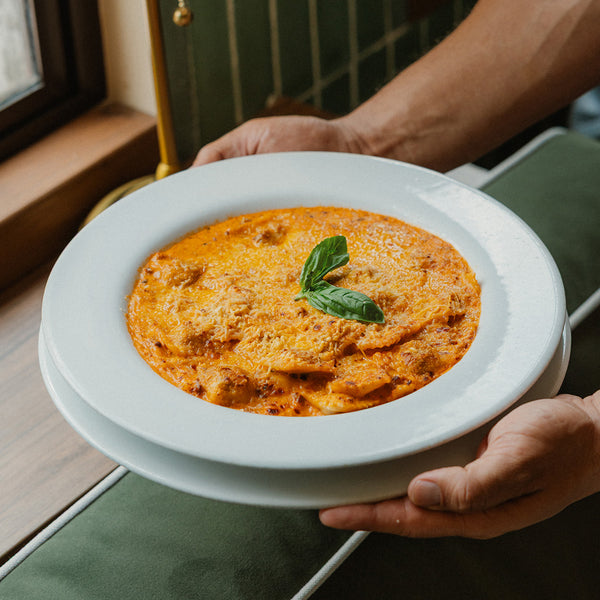Ravioli de Carne en Salsa Bolognesa