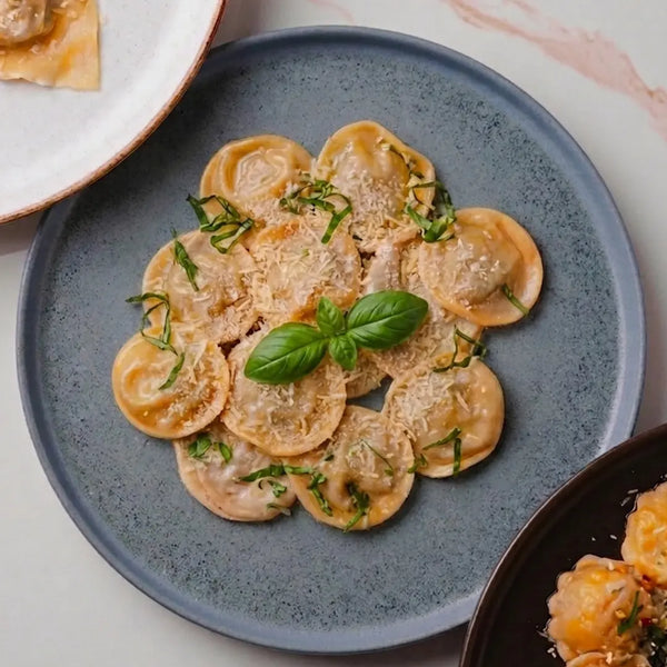 Oliva o mantequilla y albahaca