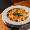 Ravioli de Carne en Salsa Bolognesa